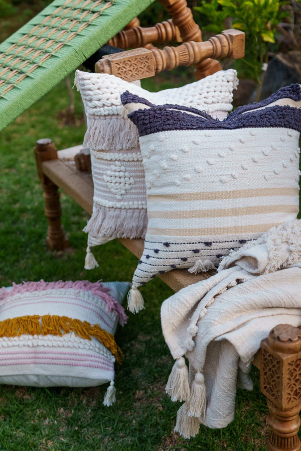 Black and white boho cushion cover with pom pom