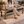 Solid teak woven bench with hand-carved Indo-African legs and natural jute seat, luxury bed-end and entryway seating